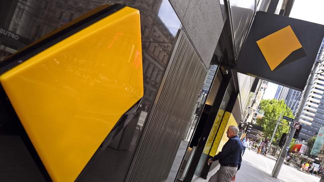 A man walks into a branch of the Commonwealth Bank in Melbourne. Picture: William West / AFP.