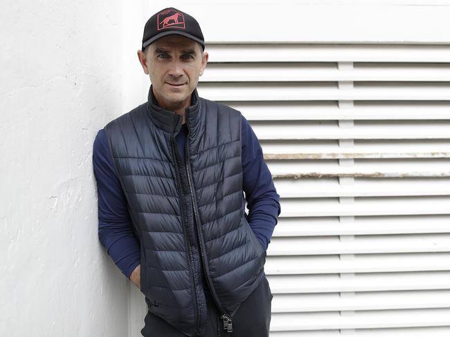 MANCHESTER, ENGLAND - SEPTEMBER 01: Justin Langer, coach of Australia, poses outside the team hotel after a press conference on September 01, 2019 in Manchester, England. (Photo by Ryan Pierse/Getty Images)