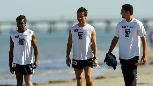 Burgoyne with former teammates Byron Pickett and Gavin Wanganeen during a Port Adelaide recovery session.