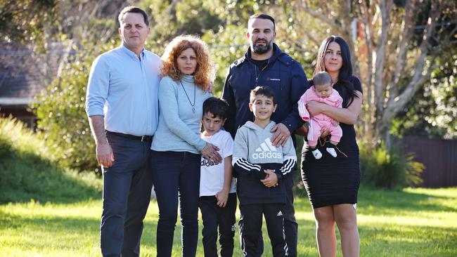 (L-R) Craig Mackenzie, Bridget Sakr, Danny Abdallah, Leila Abdallah holding Selina, and Michael and Alex Abdallah in front. Picture: Sam Ruttyn