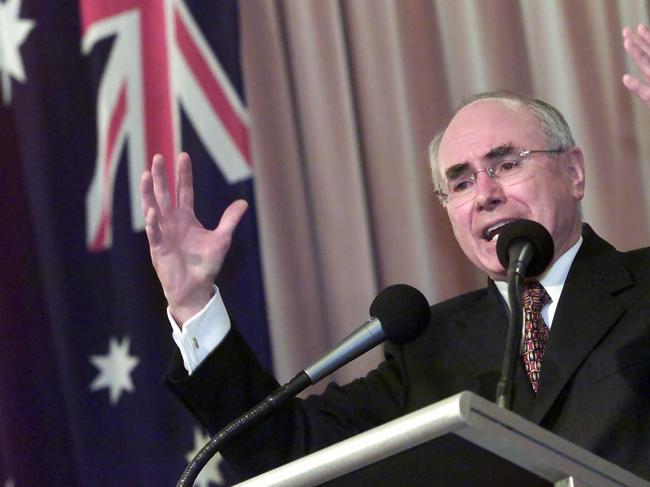 D/IAust politician Prime Minister John Howard delivering speech while visiting the Saint Hilarion Community Centre in Welland Adelaide during election campaign 16 Oct 2001.  flag