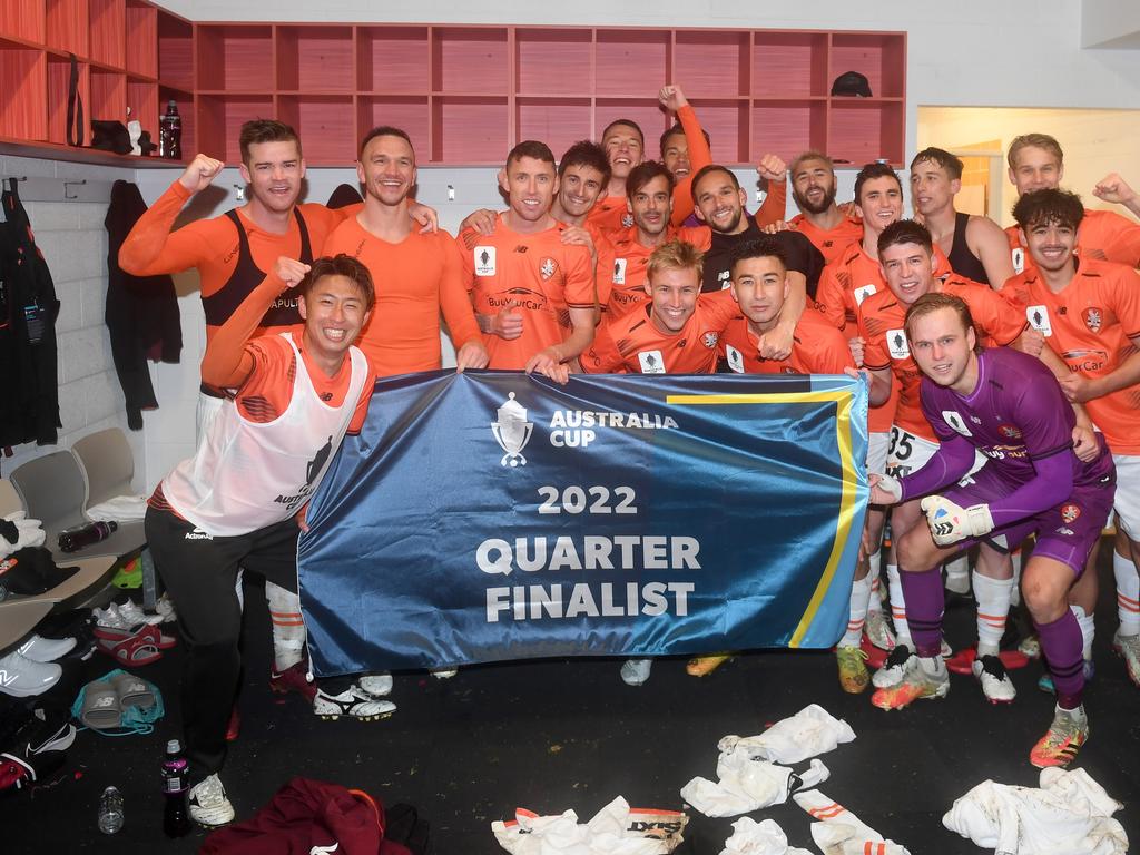 Brisbane Roar players celebrate reaching the Australia Cup quarter-finals. Picture: Morgan Hancock/Getty Images