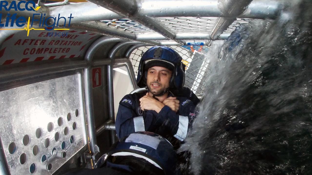 Dr Daniel Mankarios participates in a helicopter crash simulation.