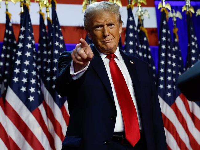 WEST PALM BEACH, FLORIDA - NOVEMBER 06: Republican presidential nominee, former U.S. President Donald Trump arrives to speak during an election night event at the Palm Beach Convention Center on November 06, 2024 in West Palm Beach, Florida. Americans cast their ballots today in the presidential race between Republican nominee former President Donald Trump and Vice President Kamala Harris, as well as multiple state elections that will determine the balance of power in Congress.   Chip Somodevilla/Getty Images/AFP (Photo by CHIP SOMODEVILLA / GETTY IMAGES NORTH AMERICA / Getty Images via AFP)