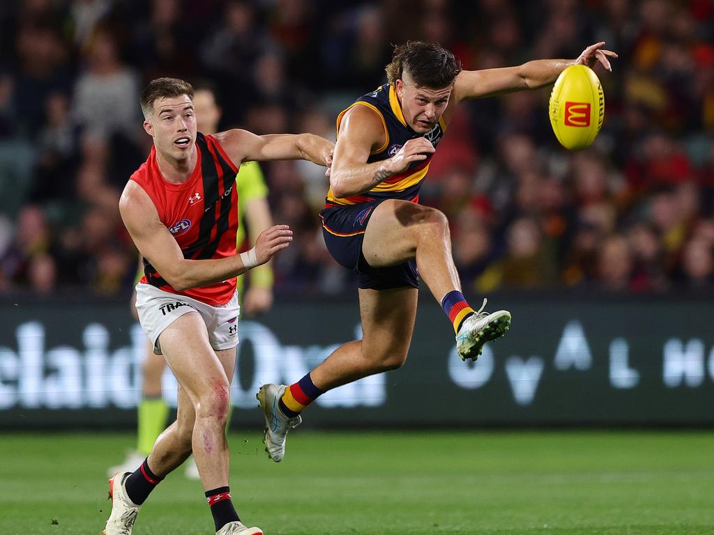 Soligo boots Adelaide forward against Essendon. Picture: Sarah Reed/AFL Photos via Getty Images