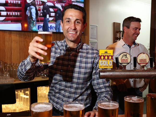 Leader of the Opposition David Crisafulli pours a beer at Chute 1 pub, Longreach. Picture: Liam Kidston.