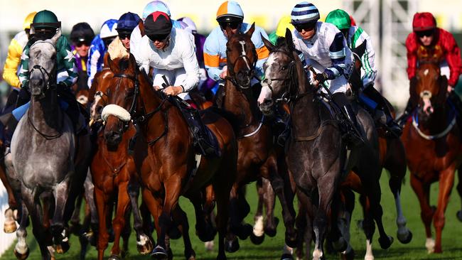 The runners and riders jostle for position at the first corner during The Copper Horse Handicap Stakes at Royal Ascot 2024. Picture: Getty Images