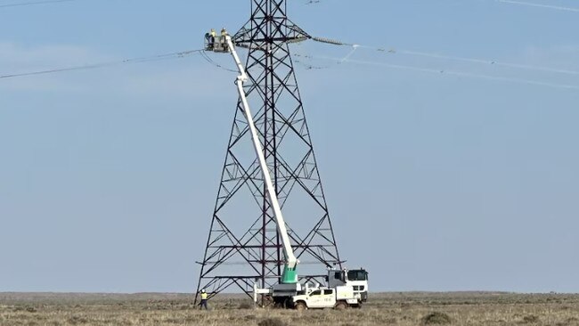 Workers trying to restore power to Broken Hill after a violent storm has left the town without electricity for days. Picture: Supplied/Transgrid