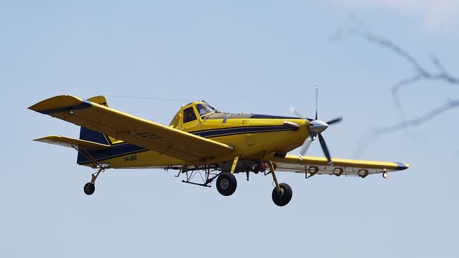 Aerial waterbomber over the Tara fires. Picture: Liam Kidston