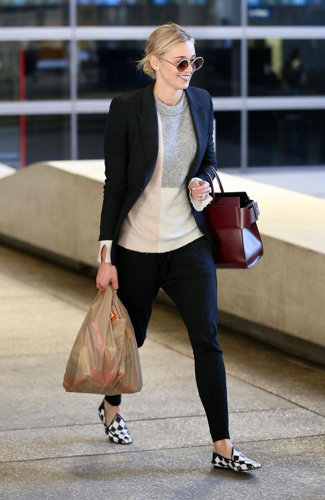 Jasmine Stefanovic looks stylish in a beige puffer coat and totes a $2,300 Louis  Vuitton handbag