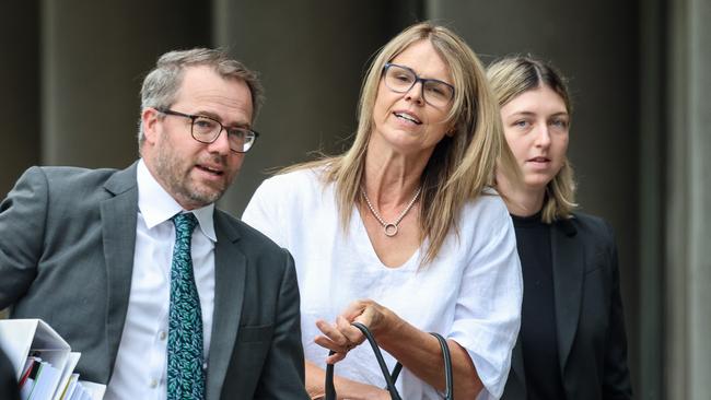 Sophie Crauford, mother of Kate Crauford, flanked by lawyers entering the Federal Court. Picture: Russell Millard