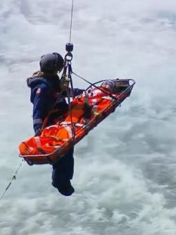 Louise getting rescued. Pic: Channel 9