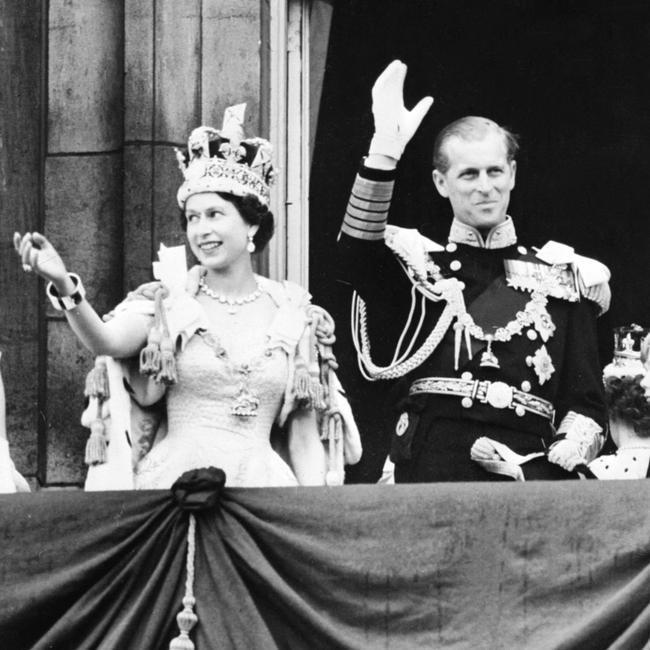 June 2, 1953, Queen Elizabeth II and Prince Philip, Duke of Edinburgh, wave following the Queen’s coronation. Picture: AFP