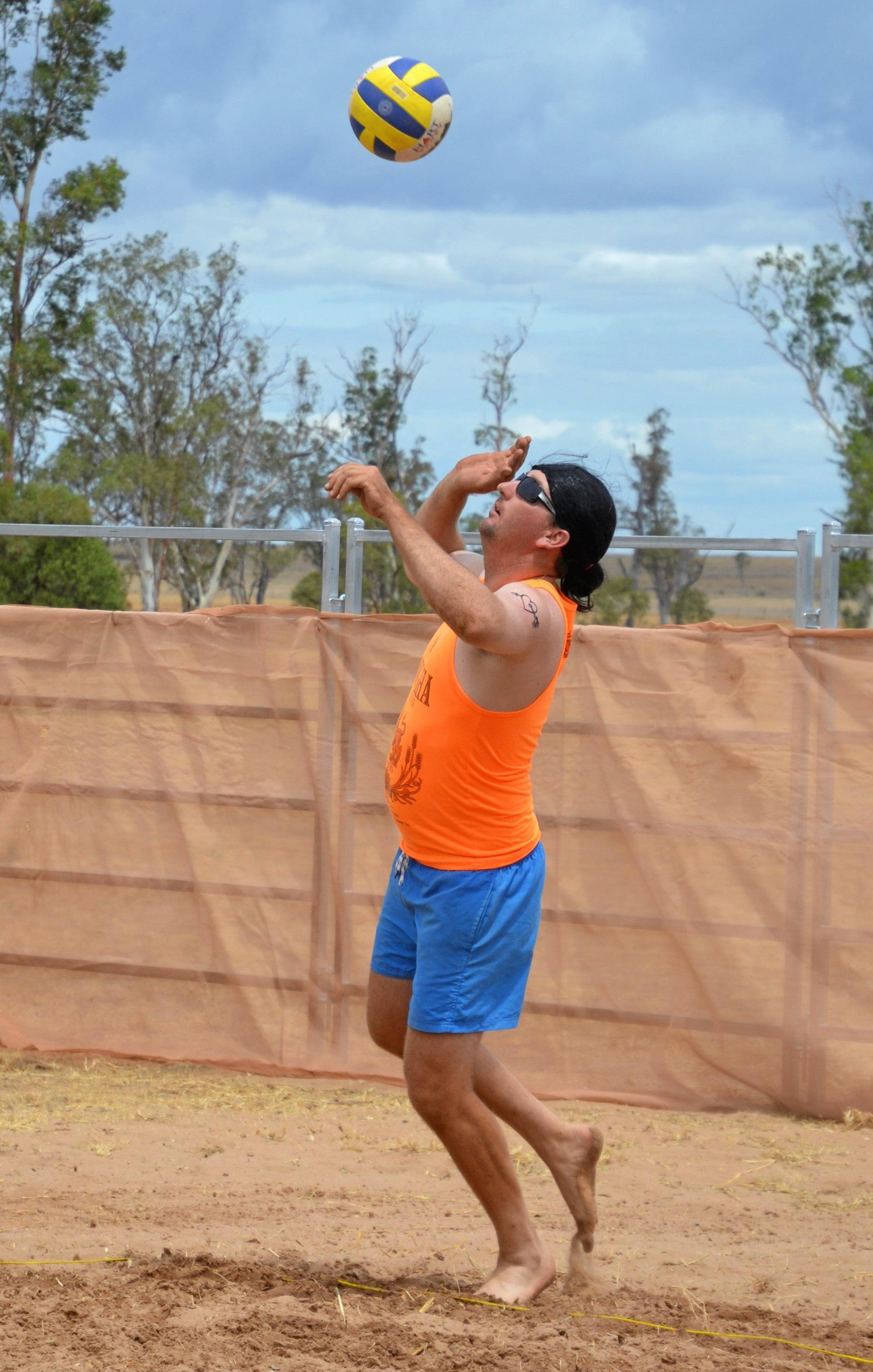 Campbell Watson serves it up at the Dulacca Sports Club annual Bush Beach Volleyball tournament. Picture: Kate McCormack