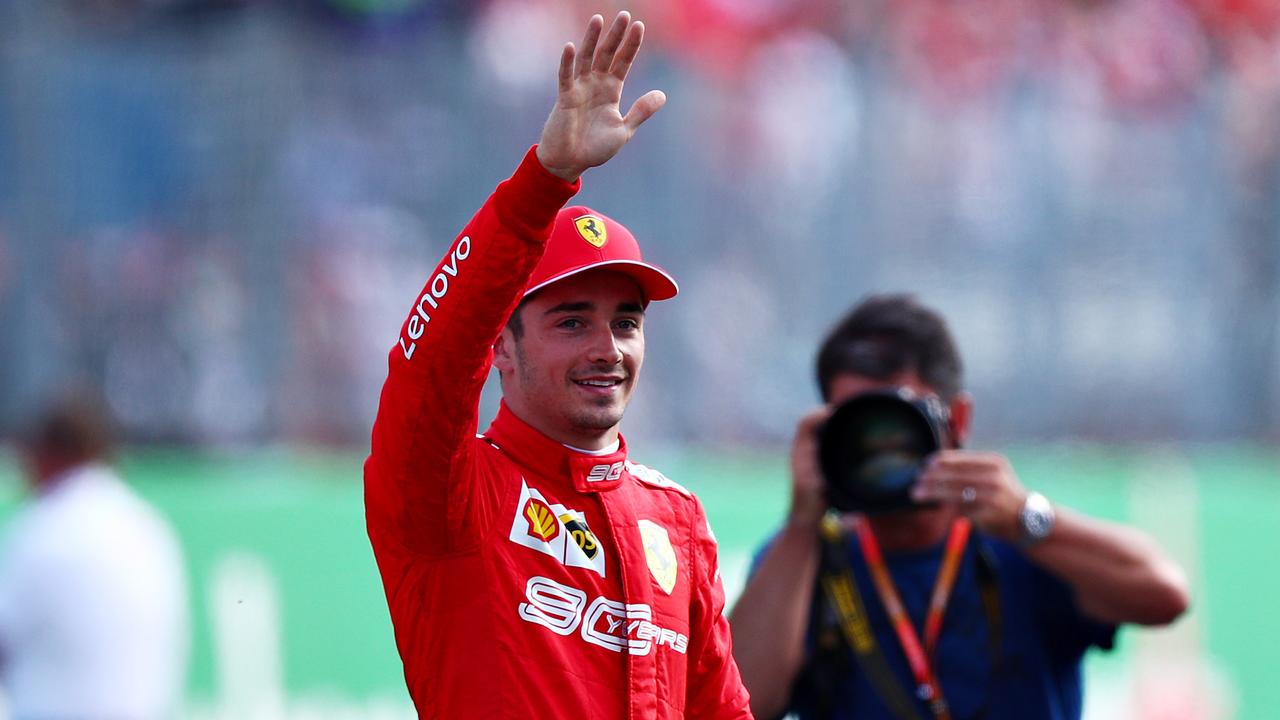 Pole position qualifier Charles Leclerc celebrates at Monza.