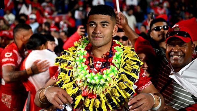 AUCKLAND, NEW ZEALAND - NOVEMBER 02: Isaiya Katoa of Tonga celebrates with fans after winning the men's 2024 Rugby League Pacific Championship match between New Zealand Kiwis and Tonga XIII at Go Media Stadium on November 02, 2024 in Auckland, New Zealand. (Photo by Hannah Peters/Getty Images)