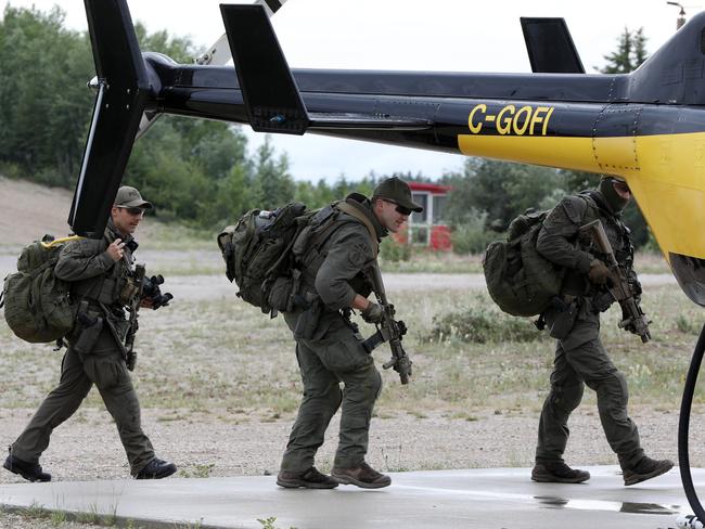 Heavily armed members of the tactical team. Picture: Clint Brewer/ News Corp Australia