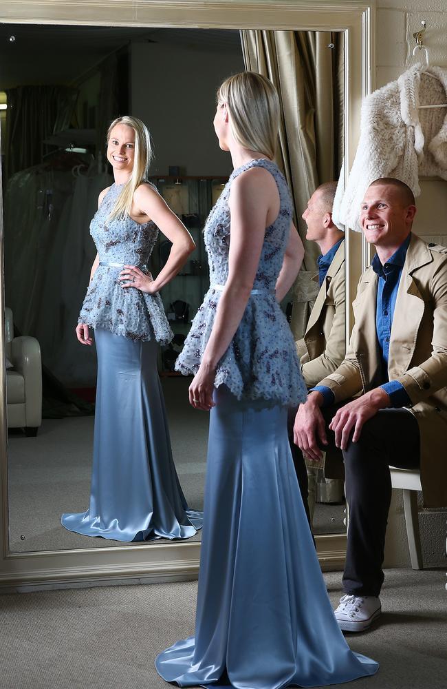 STYLE: Crows ruckman Sam Jacobs with partner Izzy Daniel at Caleche Fashion Shop. Picture: Sarah Reed.