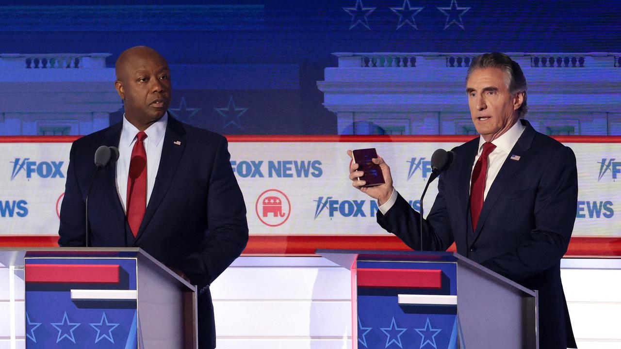 Tim Scott (right) faced off with Doug Burgum (left) in the first primary debate. Picture: Getty Images via AFP