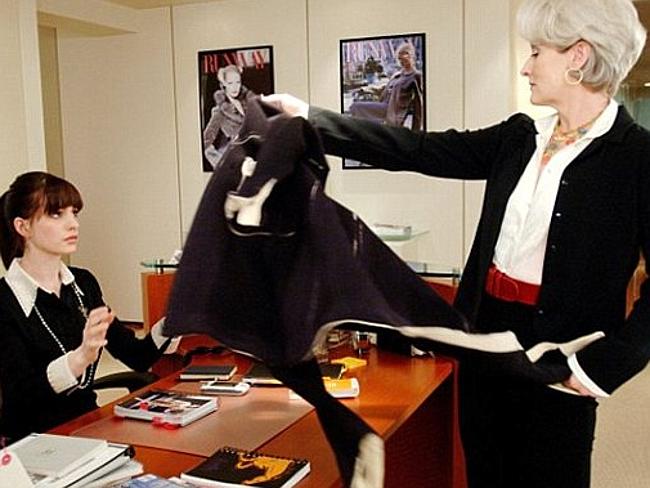 Devil Wears Prada Imperious fashion magazine editor Miranda Priestly (Meryl Streep) dumps her coat on the desk of new assistant Andy Sachs (Anne Hathaway).