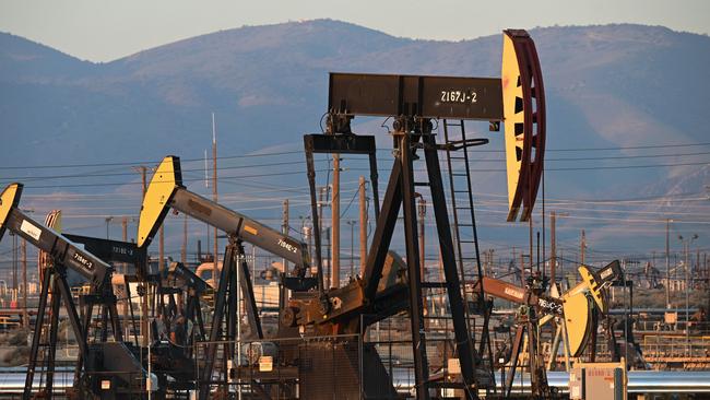Active pump jacks increase pressure to draw oil toward the surface at the South Belridge Oil Field on February 26, 2022, in unincorporated Kern County, California, approximately 141 miles (227 km) northwest of Los Angeles, California. - From rural areas of the eastern states where modern oil production began to cities in southern California where pumpjacks loom not far from homes, lax regulations and the petroleum industryâs boom and busts cycles have left the US pockmarked with perhaps hundreds of thousands of oil wells that are unsealed and haven't produced in decades. In a first, Washington is making a concerted effort to plug these wells by allocating $4.7 billion in federal infrastructure dollars to plug the wells in an effort to lessen the negative health and environmental impact of the disused wells. (Photo by Robyn BECK / AFP)