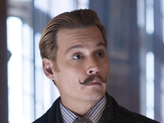 Gwyneth Paltrow and Johnny Depp in a scene from the movie Mortdecai. Roadshow Films