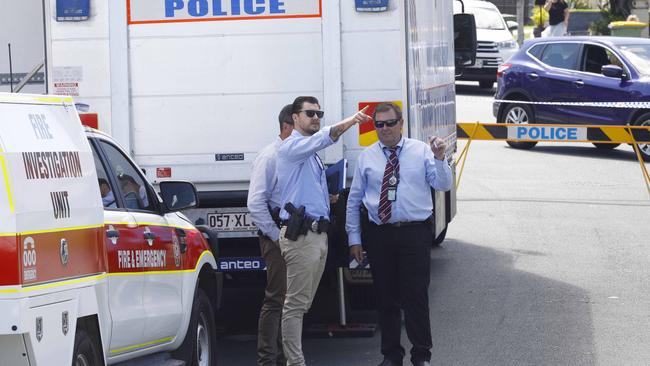 Police outside the Leichhardt St property on Thursday. Picture: Tertius Pickard