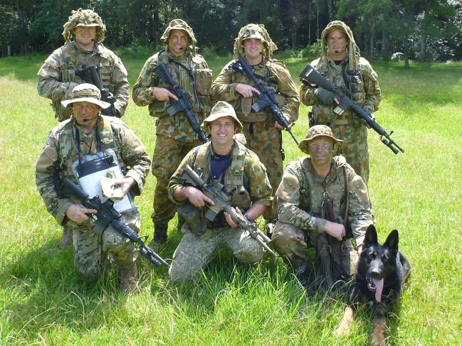 Luke Warburton and Chuck with members of the State Protection Support Unit taking part in the search for Naden. Picture: Supplied