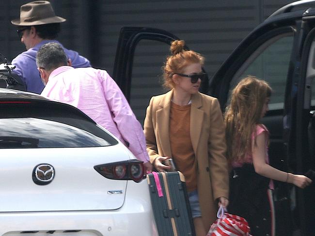 Isla Fisher, Sacha Baron Cohen and their children leave Perth Airport. Picture: BACKGRID