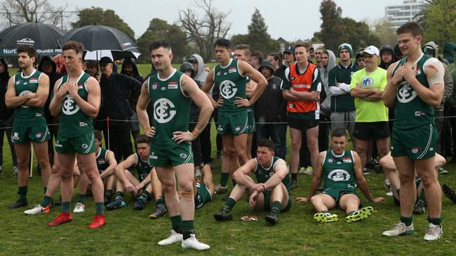 Greensborough players dejected in defeat. Picture: Hamish Blair