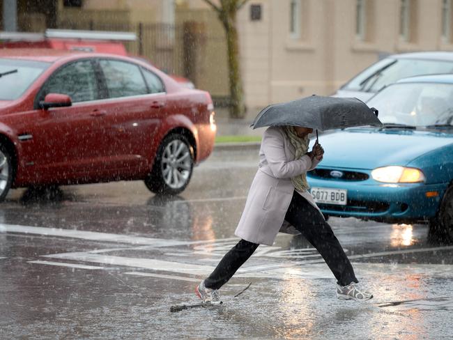 Wet weather in Victoria Square, Adelaide. Picture: Greg Higgs