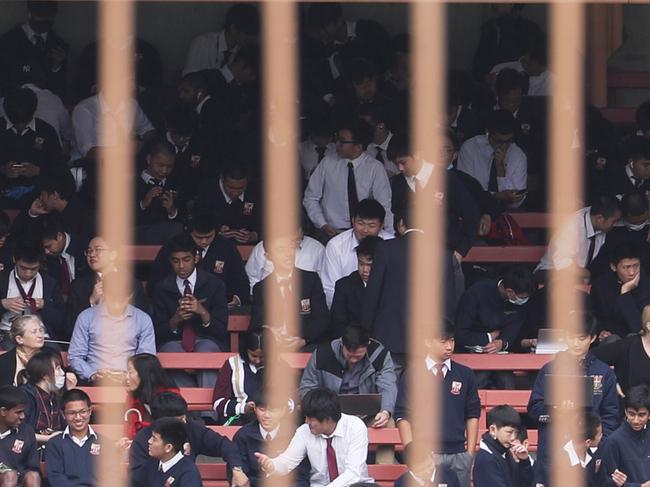 Waning school children in some shots. North Sydney boys school has been evacuated due to a threat . A large response from police and emergency services evacuated the school to North Sydney oval .picture John Grainger