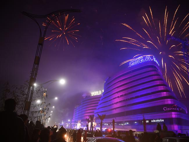 Pakistanis watch the fireworks display during the New Year celebrations in Rawalpindi on January 1, 2019. Picture: AFP