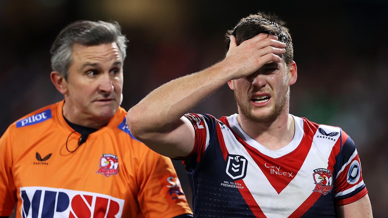 SYDNEY, AUSTRALIA – JUNE 11: Luke Keary of the Roosters holds his head as he leaves the field for an HIA during the round 14 NRL match between the Sydney Roosters and the Melbourne Storm at Sydney Cricket Ground, on June 11, 2022, in Sydney, Australia. (Photo by Mark Kolbe/Getty Images)