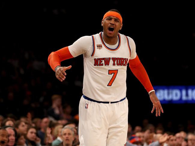 NEW YORK, NY - FEBRUARY 12: Carmelo Anthony #7 of the New York Knicks reacts after he is called for a foul in the fourth quarter against the San Antonio Spurs at Madison Square Garden on February 12, 2017 in New York City. NOTE TO USER: User expressly acknowledges and agrees that, by downloading and or using this Photograph, user is consenting to the terms and conditions of the Getty Images License Agreement Elsa/Getty Images/AFP == FOR NEWSPAPERS, INTERNET, TELCOS &amp; TELEVISION USE ONLY ==