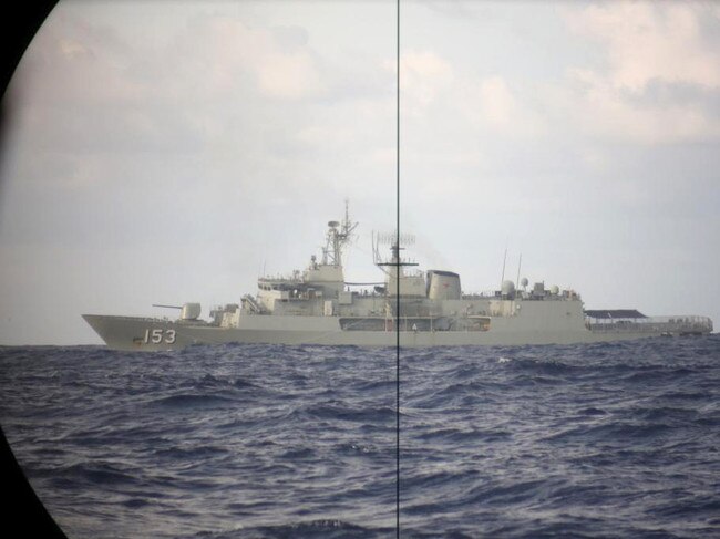 The Royal Australian Navy Anzac Class Frigate HMAS Stuart is observed through periscope on board the RAN Collins Class Submarine HMAS Sheean. While isolated, Australia is highly dependent on its shipping lanes to the northeast and northwest. Picture: Defence