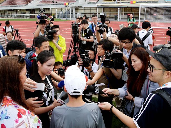 12-year-old Brisbane ball boy Stephen White, who has become something of a lucky charm for China Soccer Team. Stephen being interviewed by Chinese Media at QSAC. Pic Mark Calleja