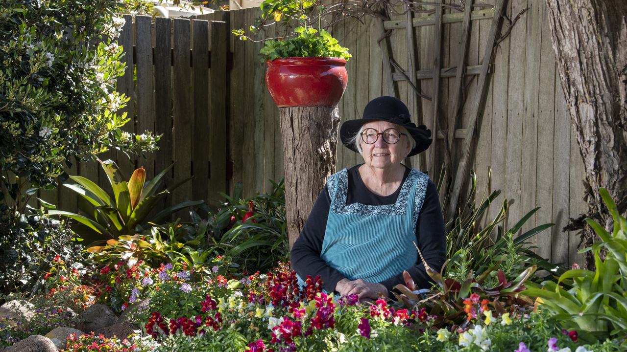 Martha Collier relaxes in her Chronicle Garden Competition entered garden. Picture: Nev Madsen.