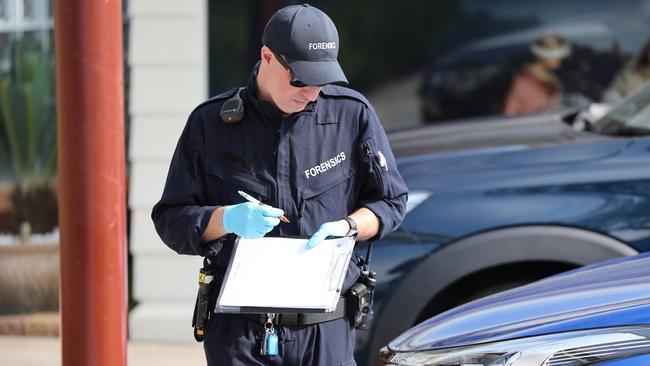 A NSW Police forensics officer at the scene of the church. Picture: Rohan Kelly