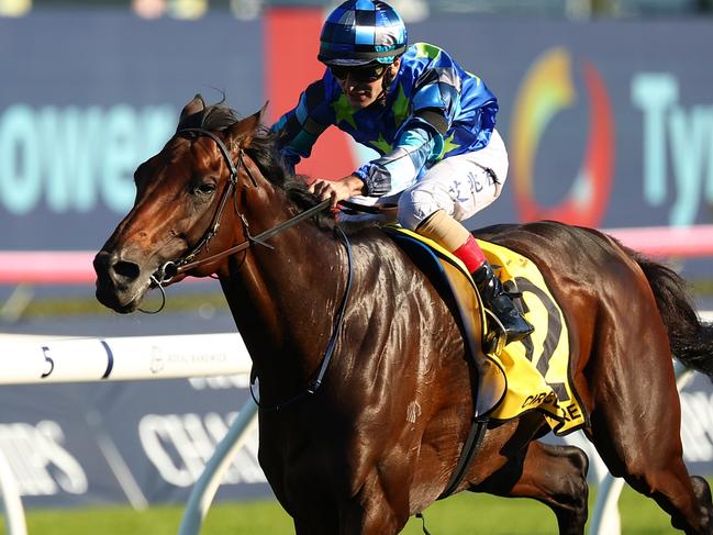 SYDNEY, AUSTRALIA - APRIL 13: Andrea Atzeni riding  Circle Of Fire wins Race 7 Schweppes Sydney Cup during Sydney Racing: The Championships at Royal Randwick Racecourse on April 13, 2024 in Sydney, Australia. (Photo by Jeremy Ng/Getty Images)