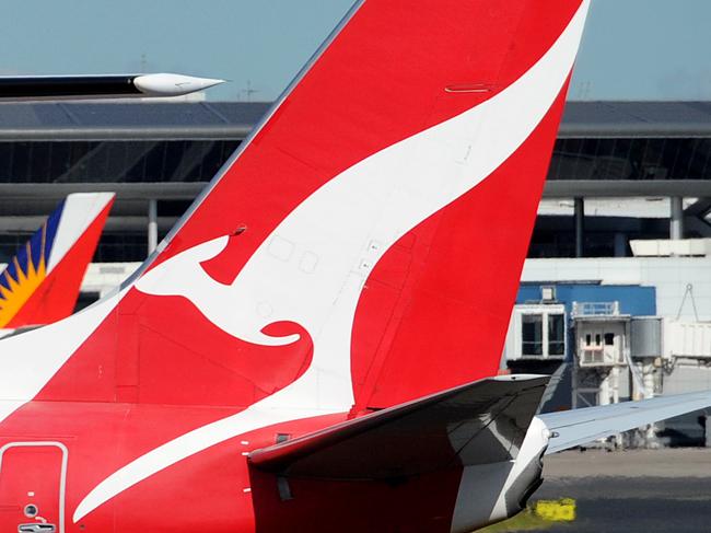 Qantas aircraft seen at Sydney International Airport, Sydney, Friday, April 7, 2017. (AAP Image/Joel Carrett) NO ARCHIVING