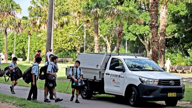 City of Sydney trucks and school children in Sydney's Prince Alfred Park after the site was urgently tested. Picture: NCA NewsWire / Nicholas Eagar