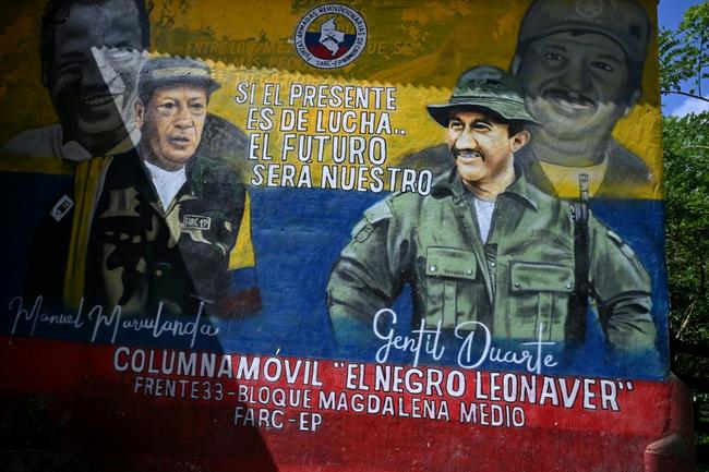 A mural with images of late leaders of the Revolutionary Armed Forces of Colombia (FARC) is seen in the country's Teorama municipality