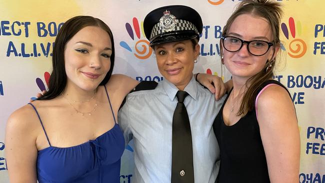 Project Booyah Townsville Police Coordinator Constable Jen Dare with graduates Bethany Freeman-Baker, 16, and Niamh Dundas, 15. Picture: Leighton Smith.