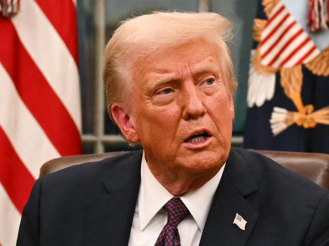 US President Donald Trump speaks to journalists about TikTok as he signs executive orders in the Oval Office of the White House in Washington, DC, on January 20, 2025. Picture: NewsWire / Jim WATSON / POOL / AFP