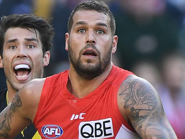 Alex Rance of the Tigers (left) and Lance Franklin of the Swans contest during the Round 13 AFL match between the Richmond Tigers and the Sydney Swans the MCG in Melbourne, Saturday June 17, 2017. (AAP Image/Julian Smith) NO ARCHIVING, EDITORIAL USE ONLY