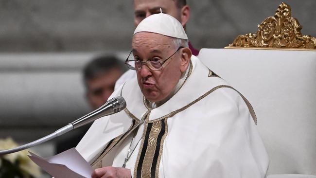 Pope Francis presides at the Christmas Eve mass at St. Peter's Basilica in the Vatican. Picture: AFP