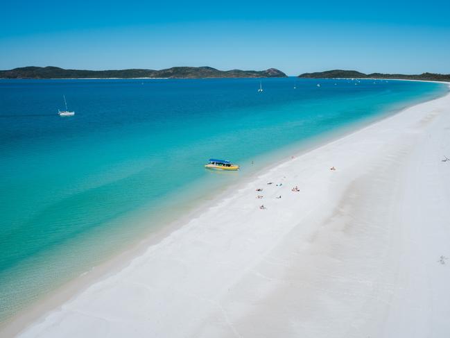 ESCAPE:  Whitehaven Beach Aerial Ocean Rafting Picture: Tourism Australia