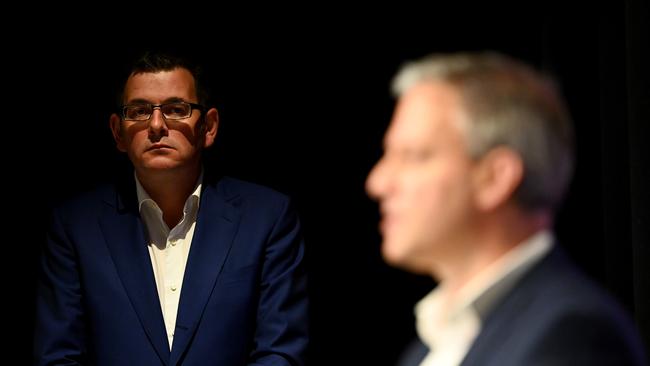 Andrews looks on as Victorias Chief Health Officer Professor Brett Sutton talks at a press conference during the coronavirus pandemic. Picture: Getty