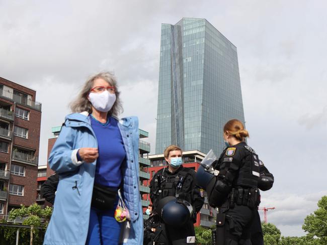 The European Central Bank headquarters during a rally against restrictions to limit the spread of the new coronavirus in Frankfurt, western Germany. More than 107 churchgoers have been infected. Picture: AFP